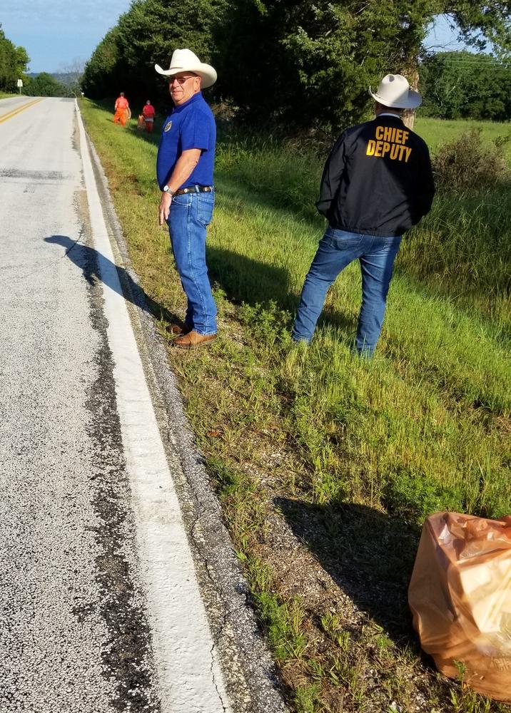 cleaning highway trash