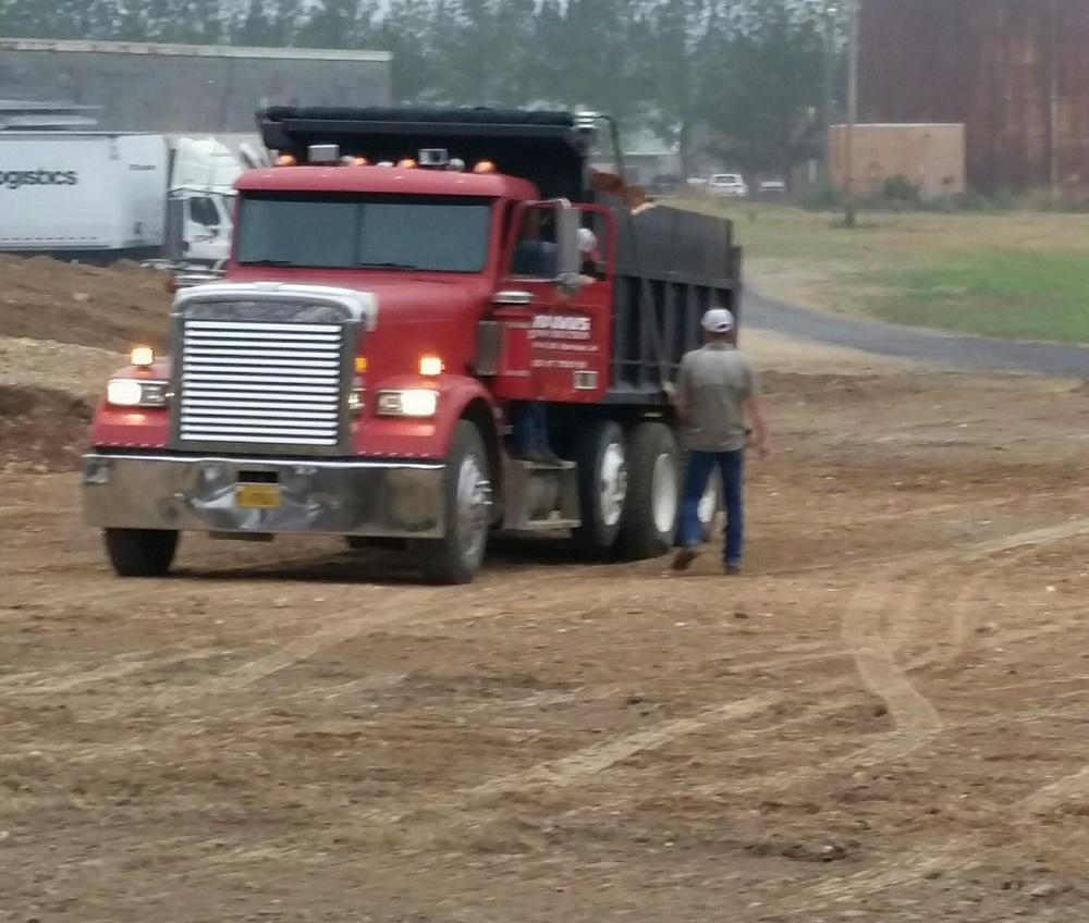 red truck hauling materials